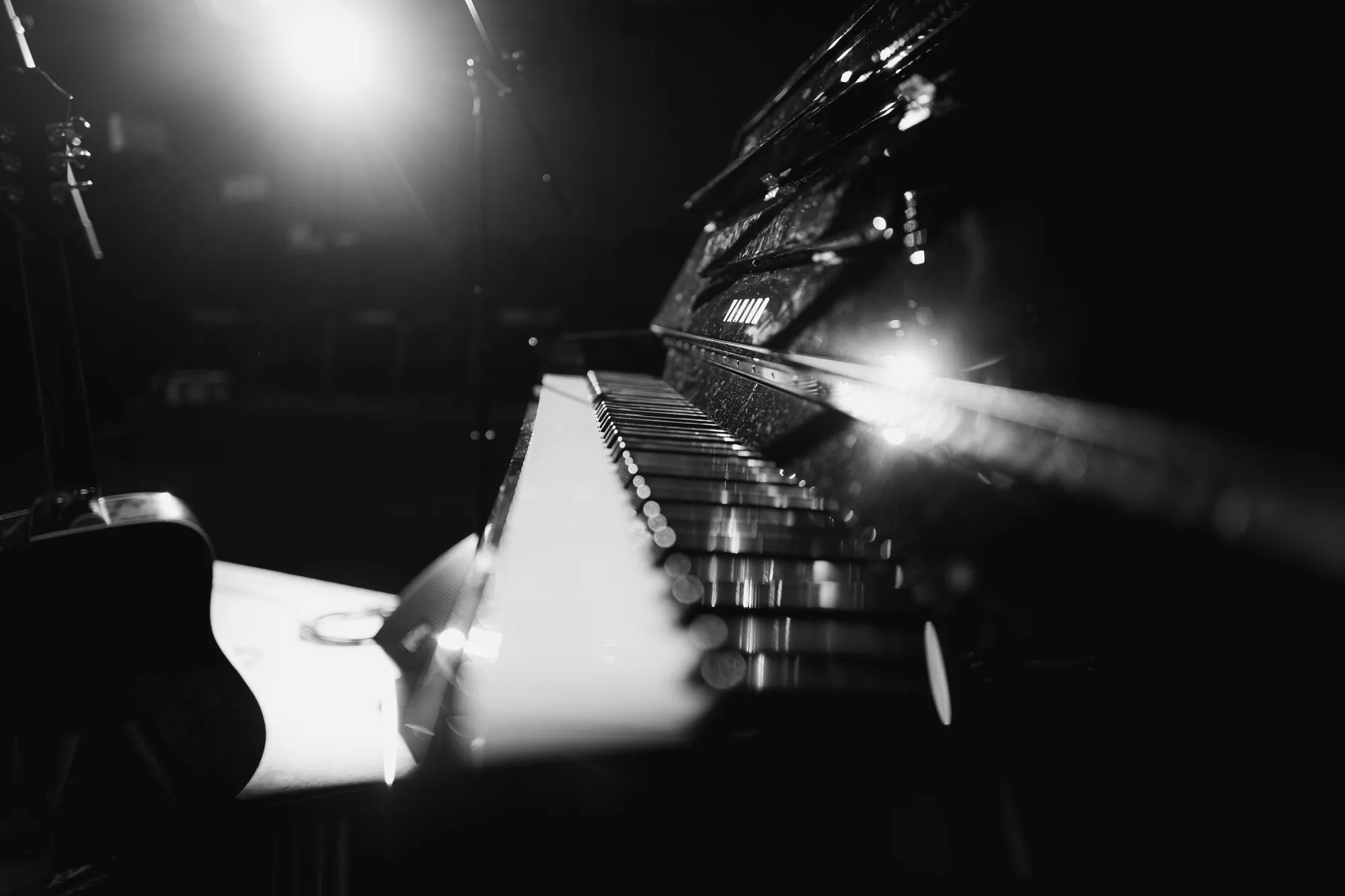 Piano keys under stage light