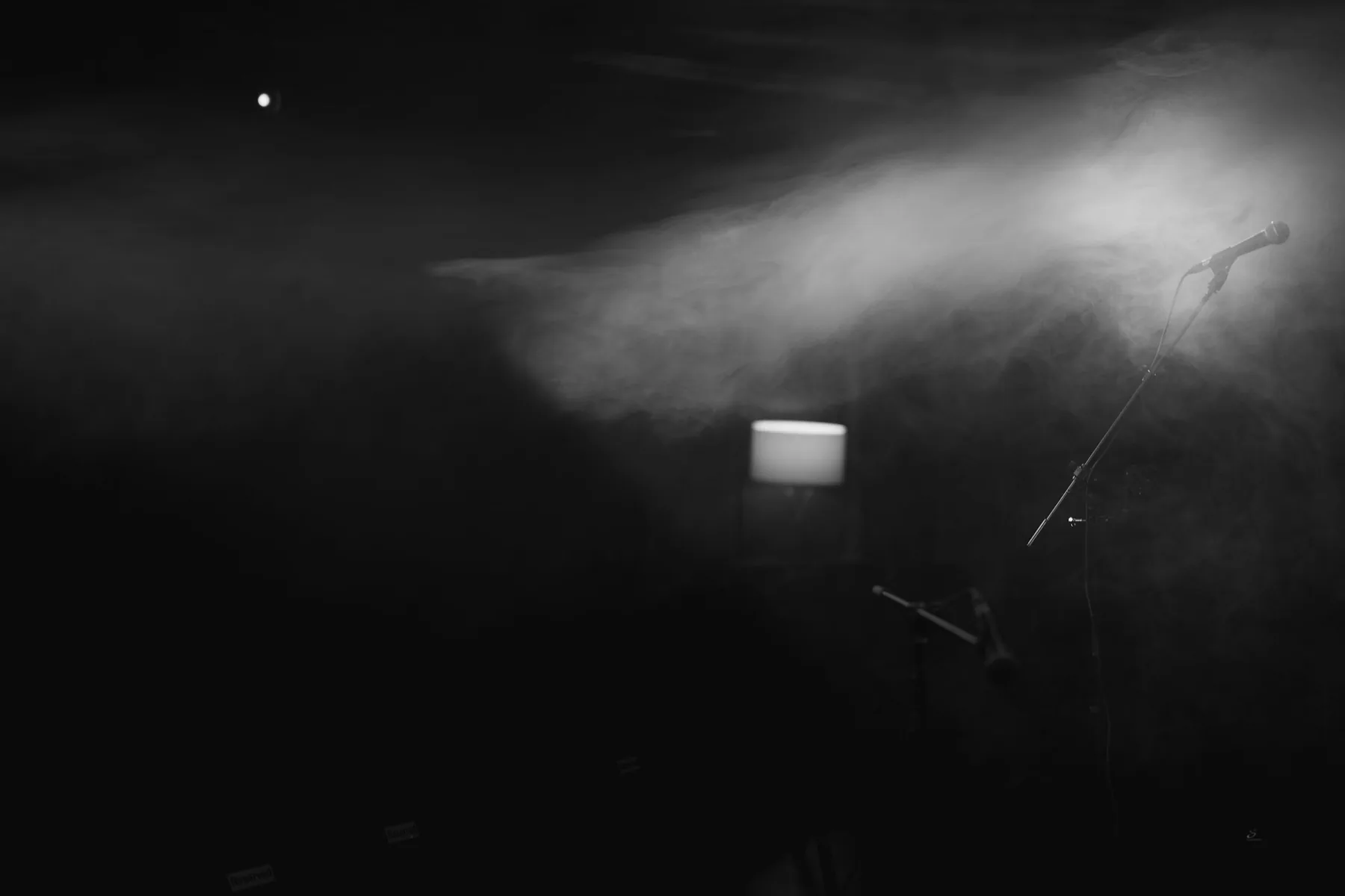 Stage haze caught in a beam of light